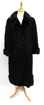 Lot 2121 - Herbert Duncan, London Black Astracan Double Breasted Coat with black mink trimmed collar,...