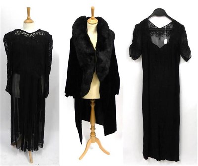 Lot 2168 - Early 20th Century Black Velvet Opera or Evening Coat with black fur trimmed collar, fully...