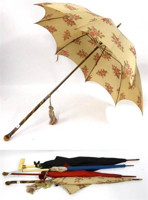 Lot 2186 - Early 20th Century S Fox and Co Paragon Parasol with floral printed cream silk mount, 90cm, another