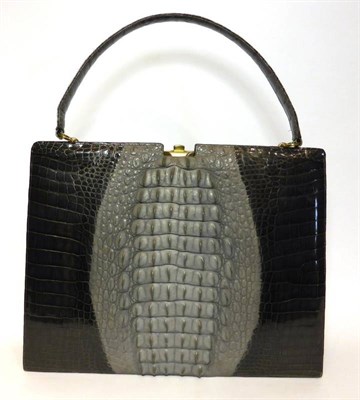 Lot 2187 - Circa 1950's An Alligator Skin Handbag with cites license, 36cm by 28cm