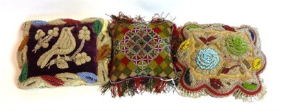 Lot 2214 - Victorian Felt Patchwork Cushion with bead trellis decoration and tassel fringing, 16cm by...