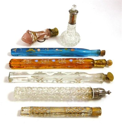 Lot 2233 - Four 19th Century Lachrymatory or Tear Catcher Scent Bottles of clear, amber and blue glass...