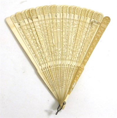 Lot 2243 - A Late 18th Century Cantonese Ivory Brisee Fan, with carved guards, pierced sticks carved with...