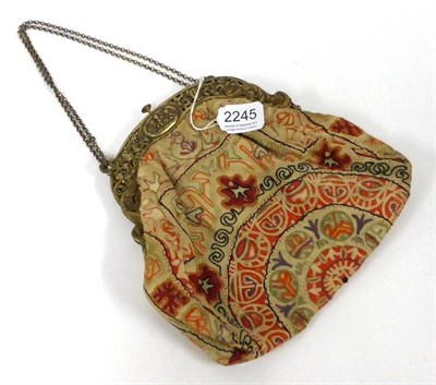 Lot 2245 - A French Silver Gilt Mounted Handbag with embroidered bag, cream silk lining with attached internal