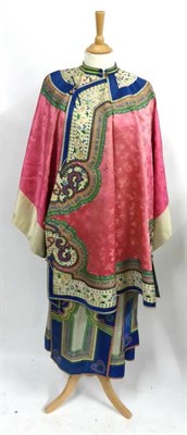 Lot 2272 - Early 20th Century Chinese Pink Silk Jacket with appliqued decorative trims, cream silk mounted...