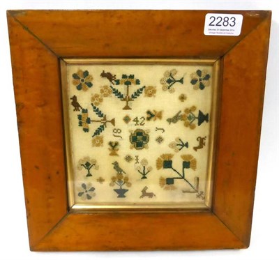 Lot 2283 - Small 'Spot' Sampler Initialled 'IJ' 1842, worked in silk cross stitch with decorative trees,...