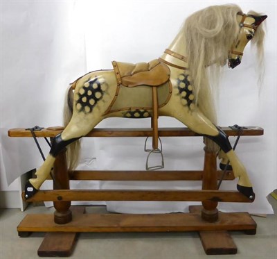 Lot 5 - Modern Painted Dapple Grey Rocking Horse on treadle base, with tan leather tack, real mane and...