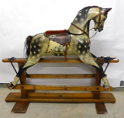 Lot 6 - Late 19th/Early 20th Century Rambler Baby Carriages Ltd Dapple Grey Rocking Horse on a treadle...