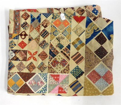 Lot 11 - Mid 19th Century Patchwork Coverlet of 'Mosaic' Design, on cream ground with diamond patches...