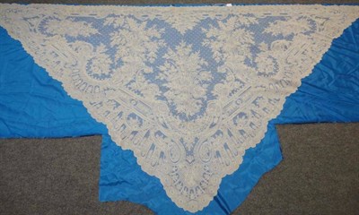 Lot 34 - Late 19th Century Nottingham Lace Shawl of triangular form, 266cm by 130cm (stitched to a...