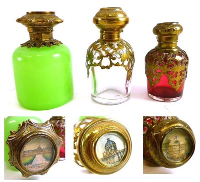 Lot 51 - Victorian Glass Scent Bottle with brass hinged mount and pierced filigree shoulder mounted...