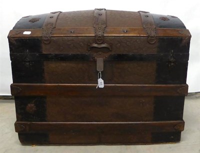 Lot 93 - 19th Century Domed Travelling Trunk with embossed panelling of acorns and oak leaves,...