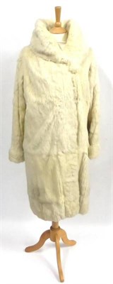 Lot 107 - Circa 1930's White Rabbit Evening Coat with exaggerated collar and one large button fastening, with