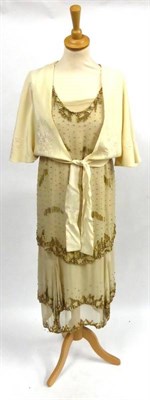 Lot 112 - Circa 1920's Cream Chiffon Layered Shift Dress with gold bead decoration, attached shift underneath