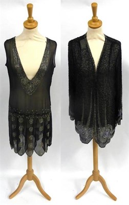 Lot 113 - Circa 1920's Black Chiffon Shift Dress with v shaped neckline and low v to the back, scalloped edge