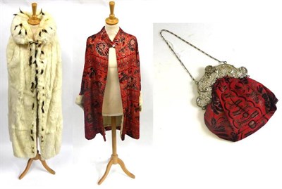 Lot 114 - Circa 1920's Evening Coat in red silk woven in black and silver with chrysanthemum heads, one...