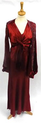 Lot 121 - Circa 1930's Bias Cut Evening Dress and Jacket in dark red satin and silk crepe, sleeveless...