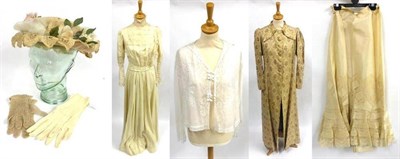 Lot 122 - Circa 1910 Two Piece Cream Wool Suit with self stripe, comprising a fitted bodice with lace...