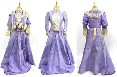 Lot 128 - Late 19th Century Lilac Silk Three Piece comprising two fitted bodices; the first with open...