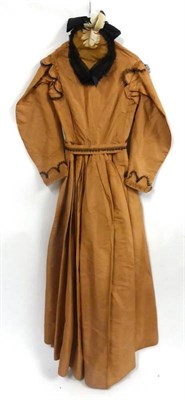 Lot 130 - 19th Century Brown Silk Dress with black lace trimmed cuffs and panel to the bodice, buttons to the