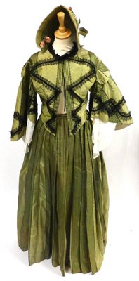 Lot 133 - Mid 19th Century Green Silk Striped Two Piece, woven with black and green serpentine shapes,...