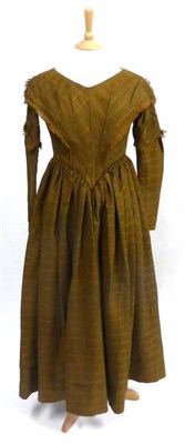 Lot 137 - Circa 1840 Brown Cotton Dress woven with large checks, with v-shaped neckline and waist and...