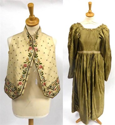 Lot 138 - Early 19th Century Olive Green Silk Dress, with long sleeves and gathered inserts to the...