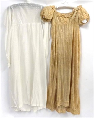 Lot 139 - Circa 1810/15 Light Brown Printed Muslin Dress with empire bodice, drawstring neckline and...