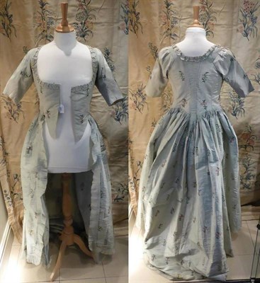 Lot 146 - Circa 1770-80 Lady's Open Robe in pale blue silk embroidered in silk with flowers, short half...