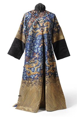 Lot 158 - Late 19th Century Chinese Dragon Robe in blue silk embroidered in gilt and silk threads...