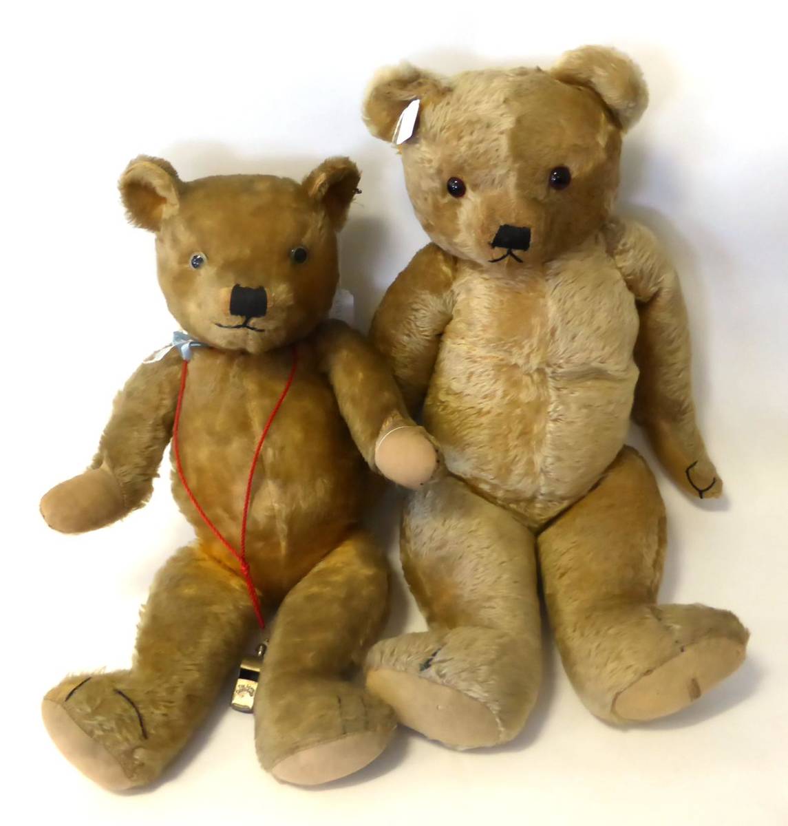Lot 1005 - Circa 1940's Merrythought Jointed Teddy Bear in yellow plush with glass eyes, stitched nose and...