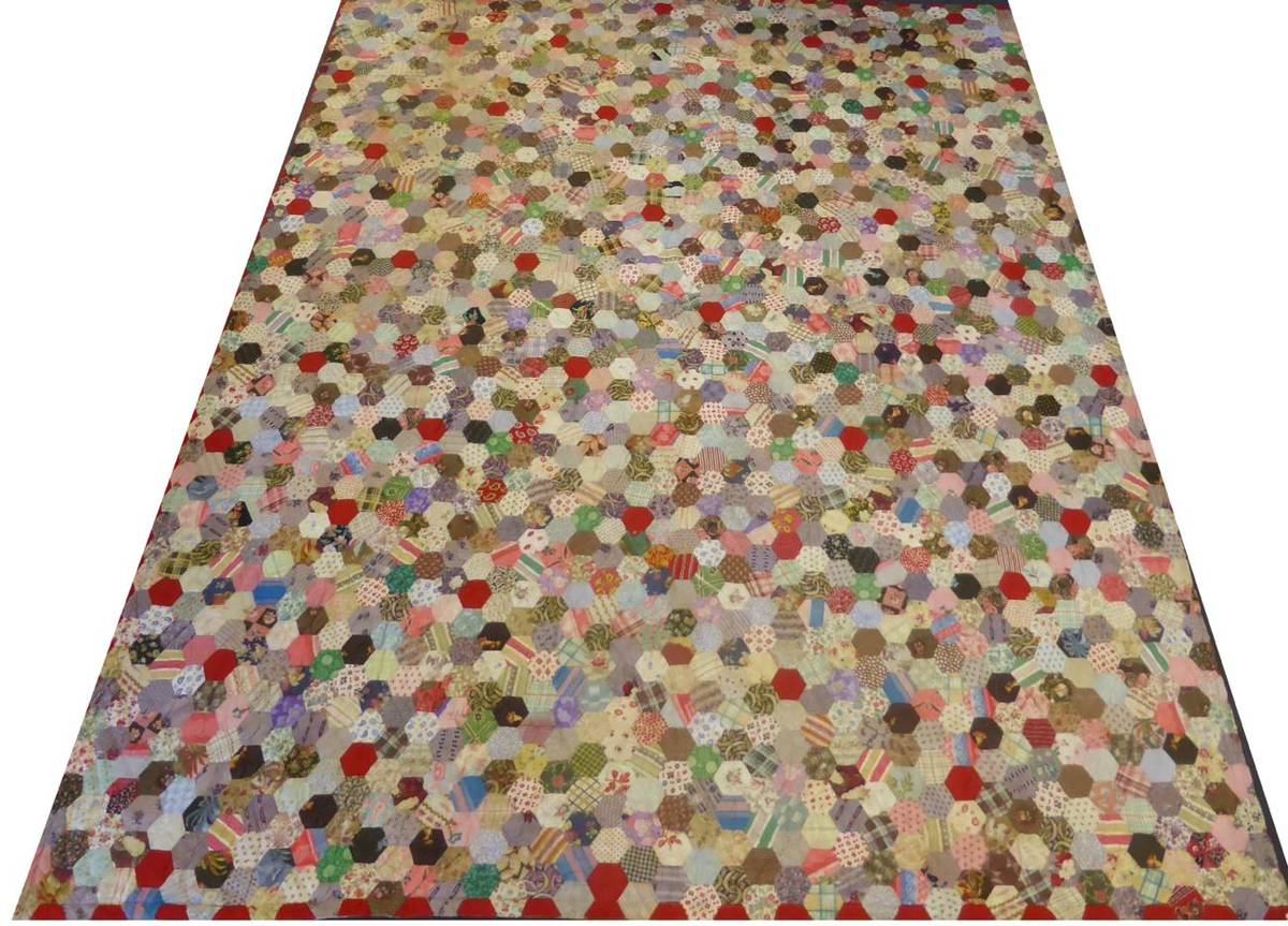 Lot 1018 - Large Early 20th Century Hexagonal Patchwork Quilt with a cotton reverse printed with hexagons,...