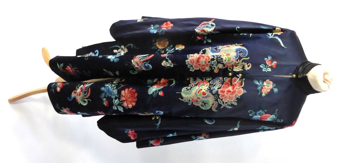 Lot 1244 - Early 20th Century Chinese Navy Silk Robe, three quarter length, embroidered in coloured silks with