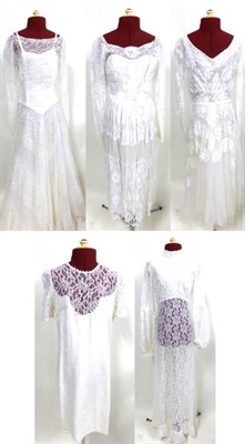 Lot 2033 - Five Circa 1960's and 1970's White Lace Mounted Dresses, including Annette Gown London long sleeved