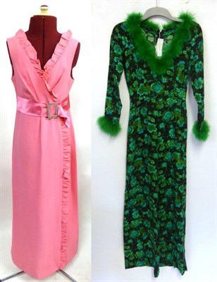 Lot 2042 - Early 1970's Pink Crepe Evening Dress with v-neck line and ruffle trim, full length, sleeveless...