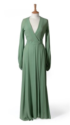 Lot 2071 - Early 1970's Ossie Clark Soft Green Crepe Full Length Wrap Dress, with long sleeves gathered to the