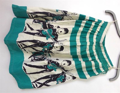 Lot 2122 - A Cotton Skirt Printed With The Beatles in black and white with green highlights and stripes,...