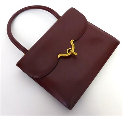 Lot 2124 - Hermes Burgundy Leather Handbag, with gilt metal mounts and leather handle, 25cm by 20cm