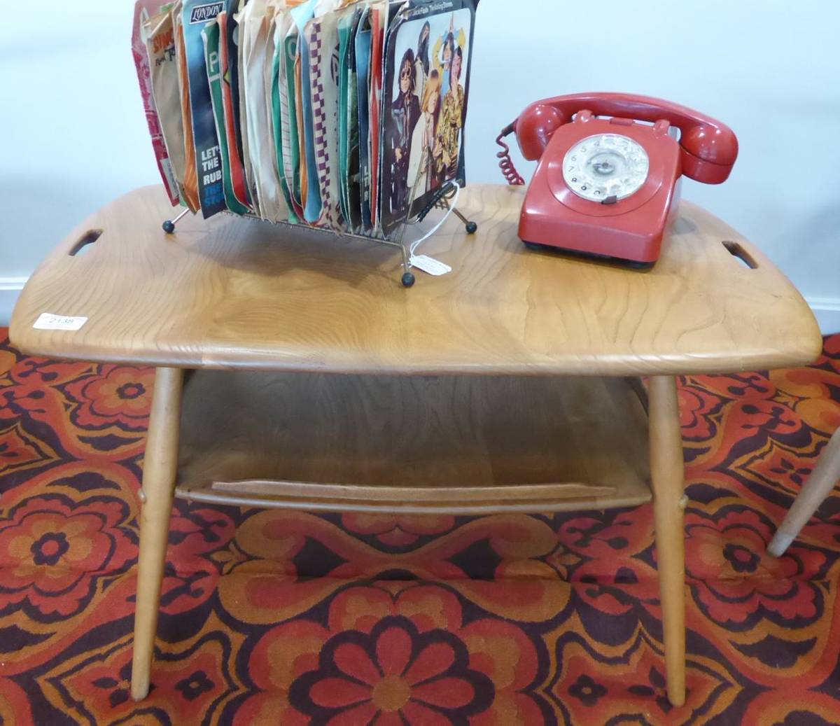 Lot 2138 - A 1960's Ercol Butler Tray/Coffee Table/Side Table, with magazine rack undertier, unmarked, 73cm by