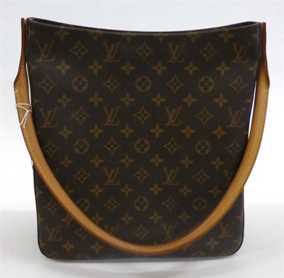 Lot 2168 - Louis Vuitton Monogram Looping Shoulder Bag with hinged tan leather handle, suede-type lining...