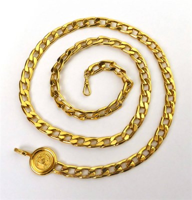 Lot 2181 - Chanel Gilt Metal Link Chain Belt with attached Chanel circular fob, 92cm