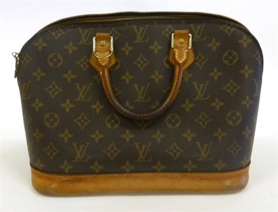 Lot 2182 - Louis Vuitton Monogrammed Alma Bag with tan leather handles and base, gilt metal mounts, canvas...