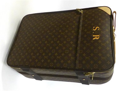 Lot 2183 - Louis Vuitton Brown Monogrammed Pegasus 70 Rolling Suitcase with leather handle and strap,...