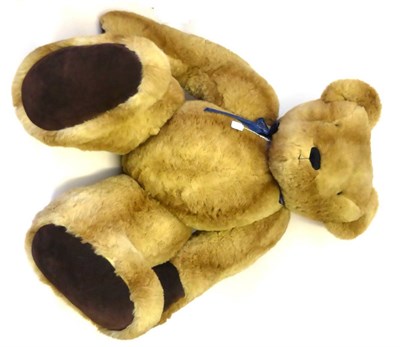 Lot 2002 - A Very Large Jointed Hartley Bear's Emporium Teddy Bear in light tan plush, dark tan suede paw...