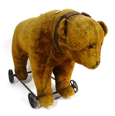 Lot 2007 - Early 20th Century Steiff Yellow Mohair Bear on Wheels (no tag), with black eyes, stitched nose and