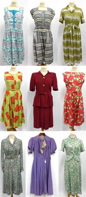 Lot 2086 - Circa 1940's and 1950's Day Dresses and Suits including a green tea dress with red and white floral