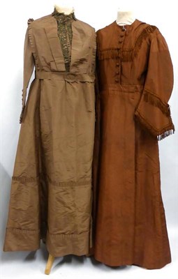 Lot 2104 - 19th Century Brown Silk Dress with applique trim and attached belt; Rust Brown Silk Dress with...