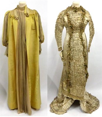 Lot 2107 - 19th Century Yellow Silk Pelisse Robe, with peach silk panel mounted with chiffon to the front,...