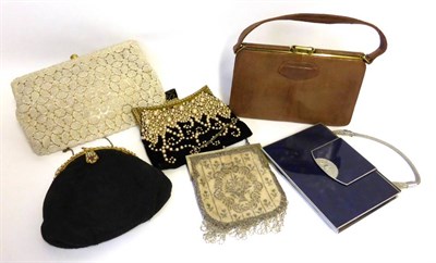 Lot 2130 - Circa 1930s and Later Evening Bags including a black beaded bag with gilt metal enamel hinged mount