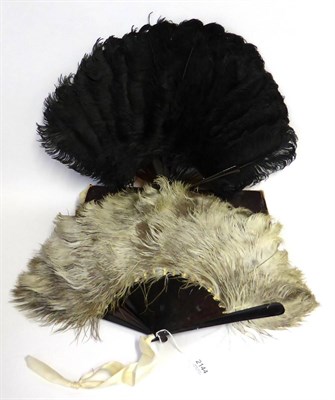 Lot 2144 - Late 19th Century Black Ostrich Feather Fan, 39cm; Another Similar with cream and brown tipped...